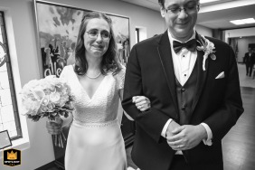 A newly married couple leaves Holy Trinity Episcopal Church in Decatur, Georgia, the joy of their union evident as they exit the ceremony.